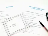 Vollmacht zum Abholen des Kindes vom Hort. Ein Stift liegt auf dem Formular.